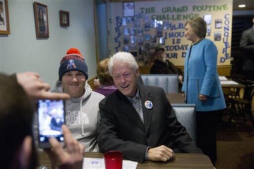 Former president Bill Clinton explains it all to young Democrats. (AP Photo/Matt Rourke)