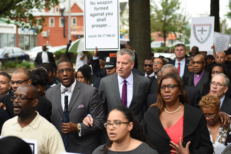 New York City Mayor Bill de Blasio joined congregants of the Greater Allen A.M.E. Church to march in solidarity with Emanuel A.M.E. in Charleston, S.C., where a gunman killed nine people gathered for Bible study on June 17.